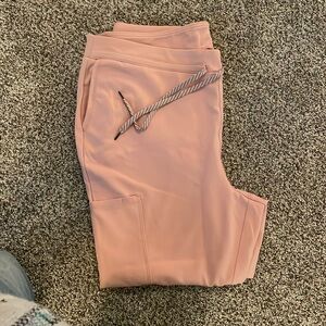 Jaanuu scrub bottoms, a light blush pink color